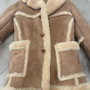 Saks fifth avenue suede coat size 36 or 6. Very warm, worn once to ski.